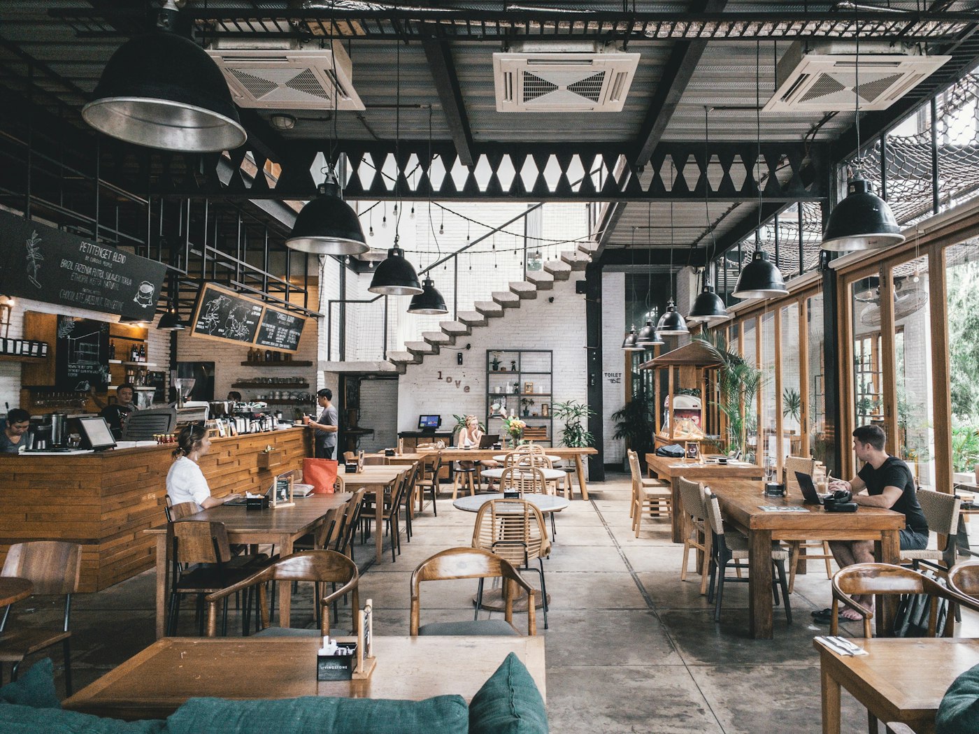 Interior public space with warm light and gathering atmosphere